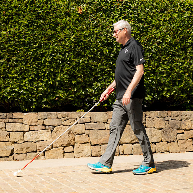 Blind employee, Geoff walking at Nike World Headquarters